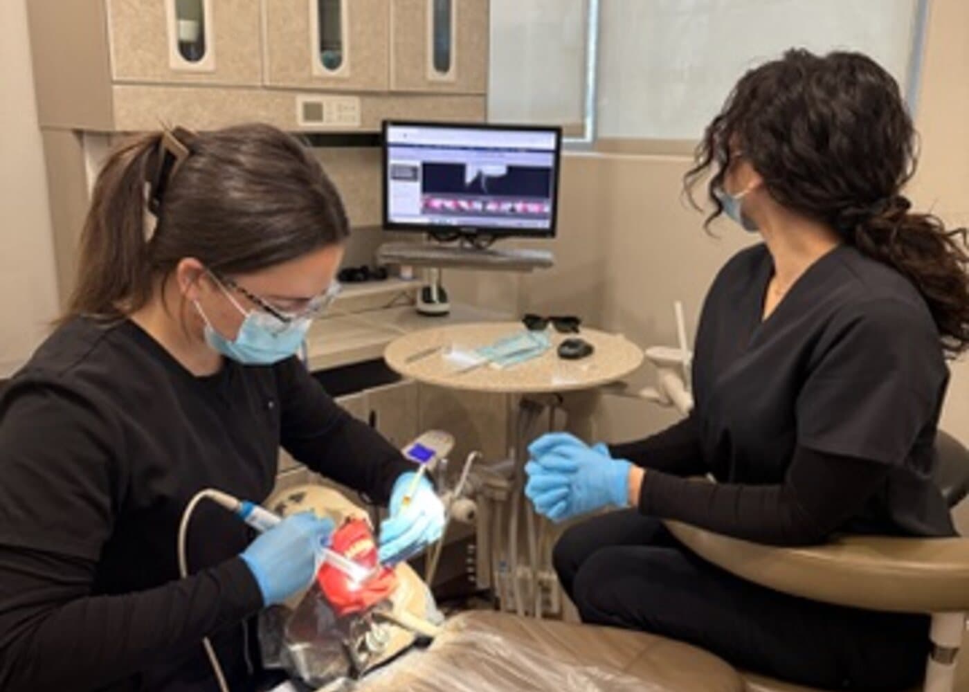 Students practicing chairside and radiography workflow