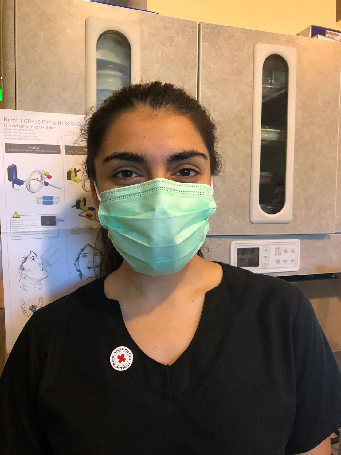 Student positioning dental x-ray equipment