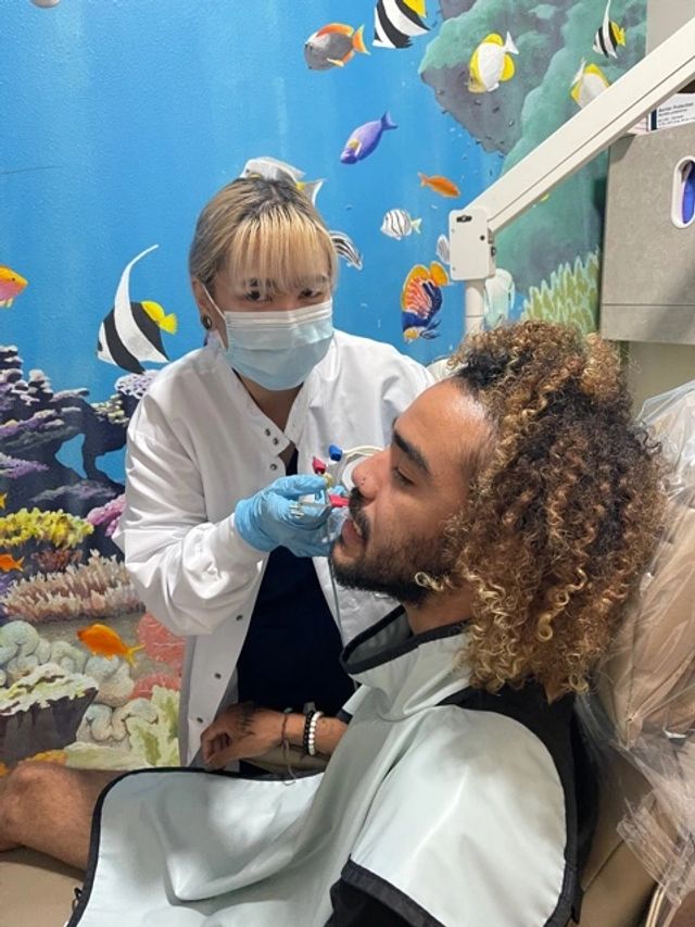 Students learning dental x-ray workflow