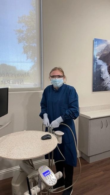 Students learning infection control protocols
